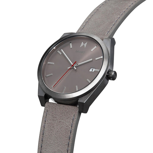 The MVMT Element Radium Grey Men's watch features a silver case, Japanese quartz, grey face, leather strap, and date display.