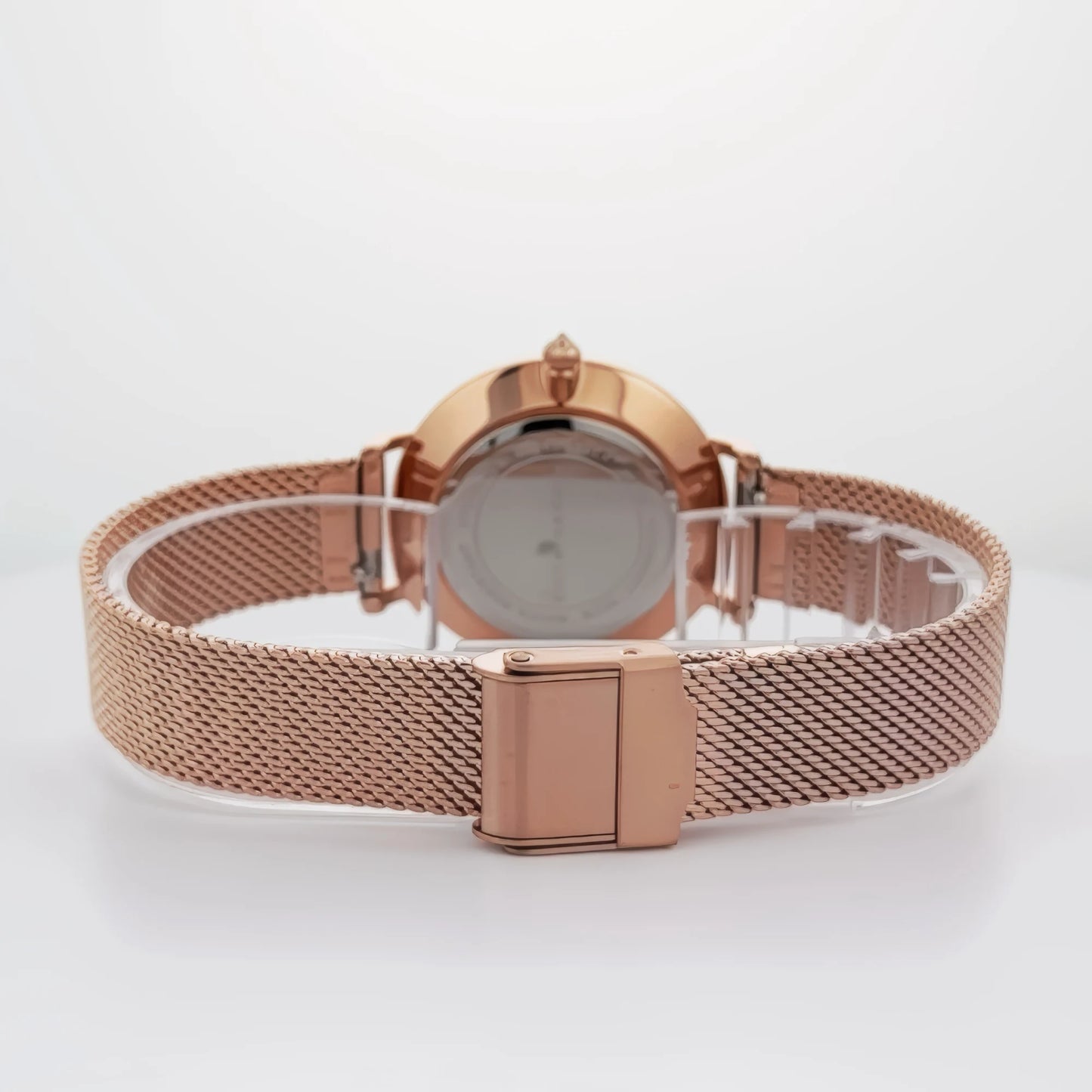 Alfred Sung Serenity ladies watch, mesh band, rose gold, white dial, viewed back against a white background.