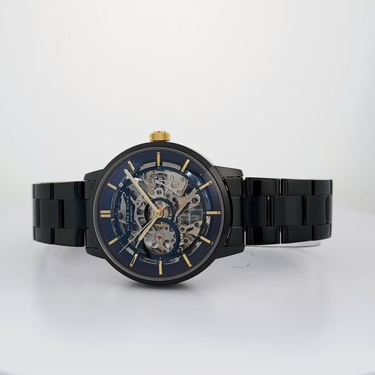 Alfred Sung Automatic III men’s watch with black skeleton dial and bracelet, gold accents, shown on white surface.