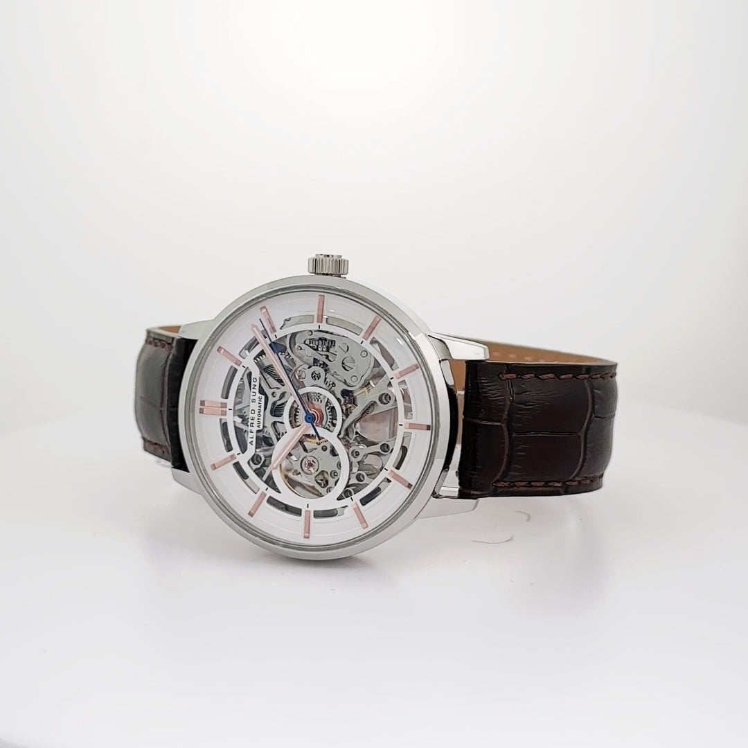 Alfred Sung Automatic III men's watch with white skeleton dial and brown leather strap.