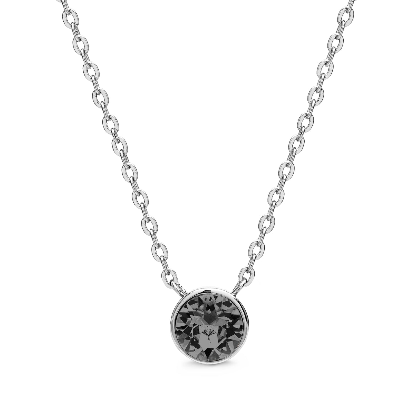 Aura's Pendant Necklace With Crystals features a round black gemstone, elegantly accented with sparkling Swarovski Crystals.