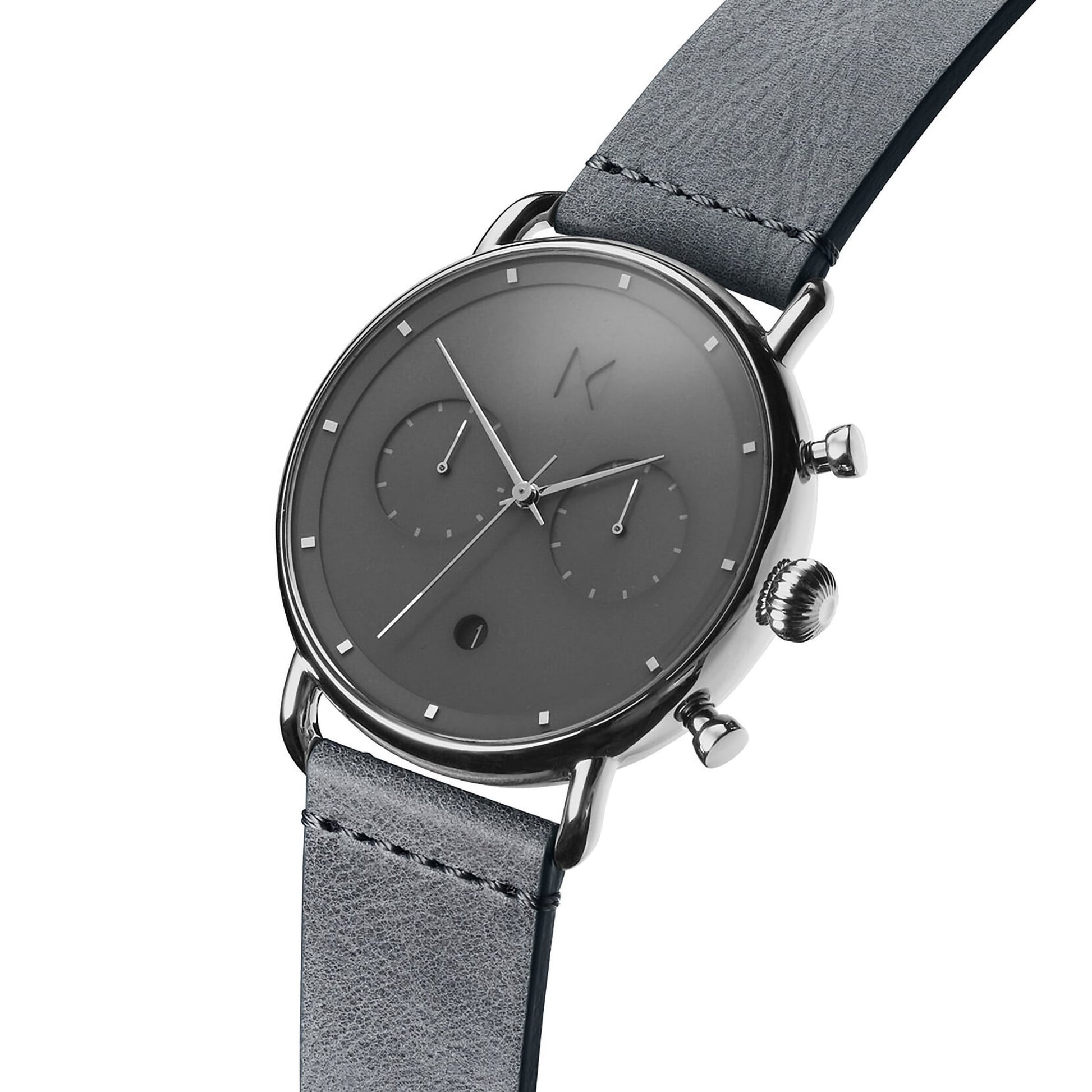 MVMT Blacktop Grey Men's watch is a minimalist chronograph with subdials, a round face, and a gray leather strap.