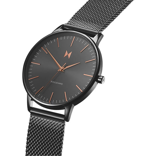 Gunmetal MVMT Boulevard Lincoln watch with mesh band, rose gold accents; sleek black design for ladies.