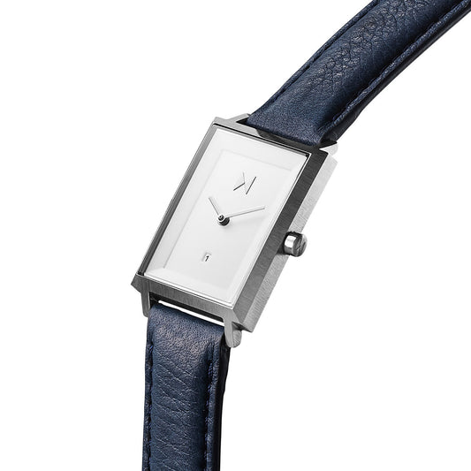 The MVMT Signature Square Aubrey watch boasts a white face, blue leather strap, and Japanese Quartz Movement.