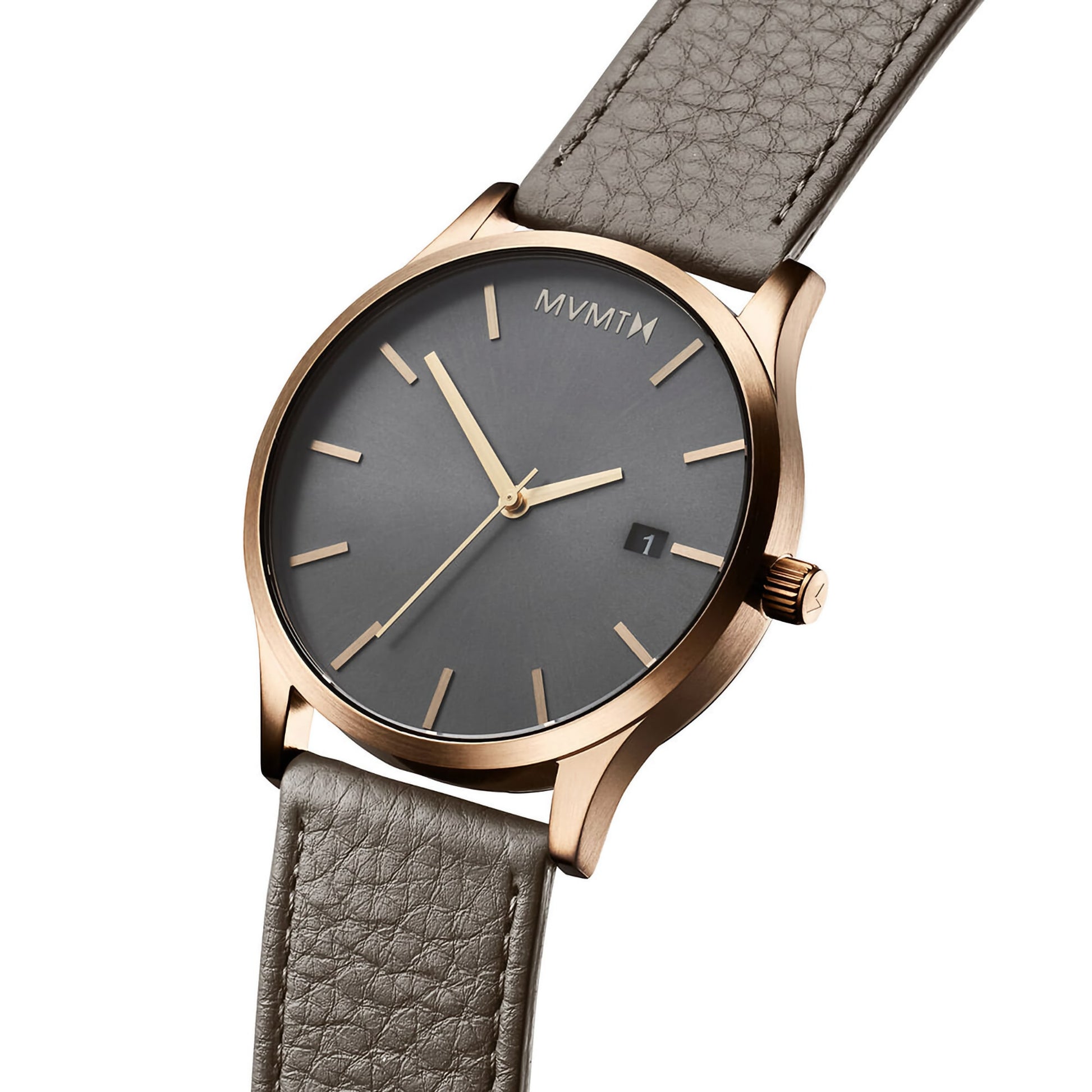 MVMT Classic Bronze Age men's watch with a minimalist face, sage grey leather strap, and date display.
