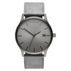 MVMT Classic Monochrome watch: minimalist gray, leather strap, date feature, and Japanese quartz movement.