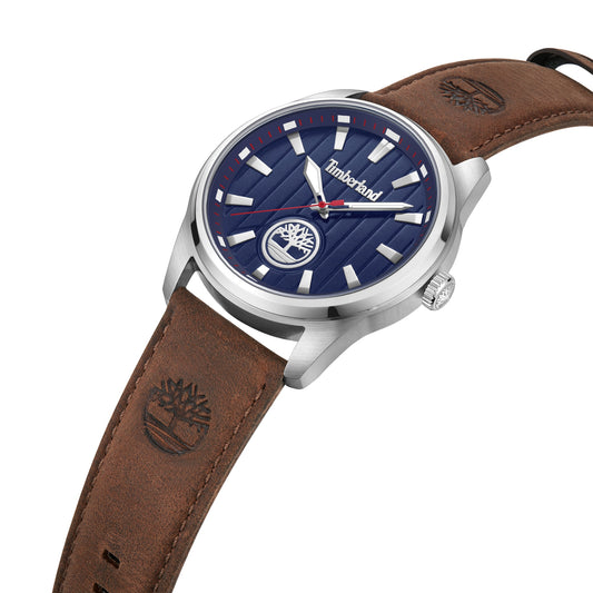 Timberland Northbridge watch with minimalist blue face, red/white accents, brown leather strap & tree logo.