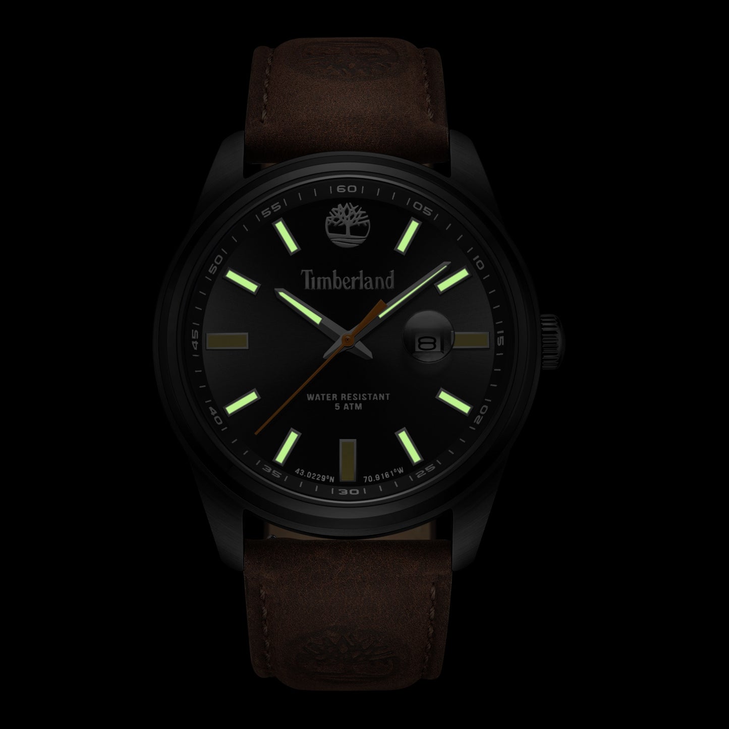 Timberland Orford watch, Japanese quartz, brown leather strap, glowing markers on black face.