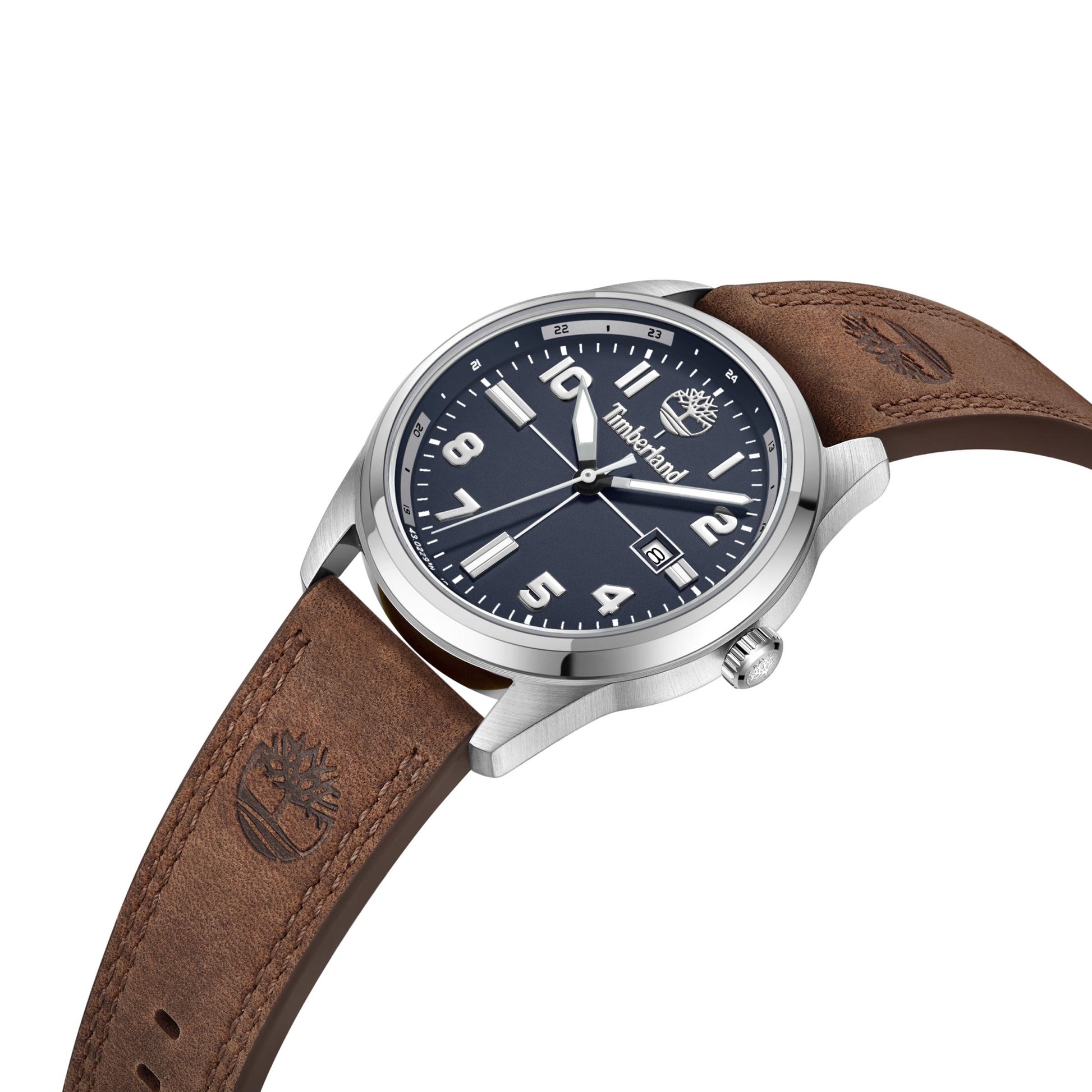 The Timberland Sherbrook Watch features a blue dial, brown leather strap, and stainless steel case.