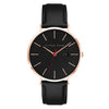 Alfred Sung Metropolitan watch with rosegold case, red second hand, date display, and black leather strap.