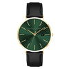 Alfred Sung Metropolitan watch features a green dial, gold hour markers, black leather strap, and date display.