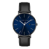 Alfred Sung Metropolitan watch: blue dial, silver case, Italian leather strap, date display at 3 o'clock.