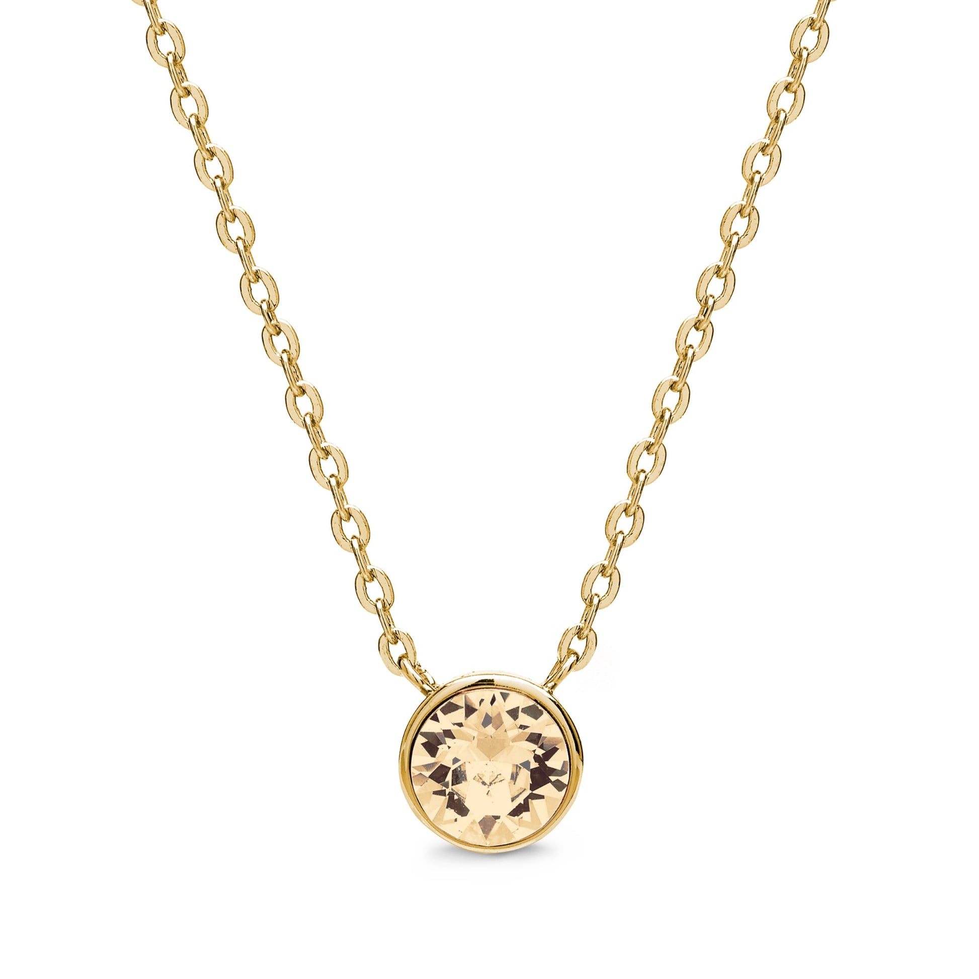 The Aura Pendant Necklace With Crystals is an elegant piece crafted from 18k gold, featuring a round, sparkling gemstone embellished with exquisite Swarovski Crystals.